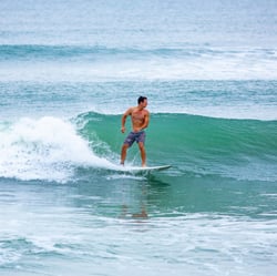 Man_Surfing-1200x1200 (1)