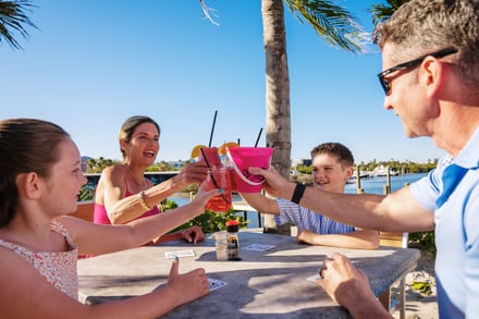 New Smyrna Beach - River Deck Tiki Bar & Restaurant - Family Cheers - 2025 (Roundhouse Creative)