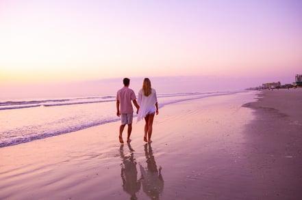 Couple walking at the Beach